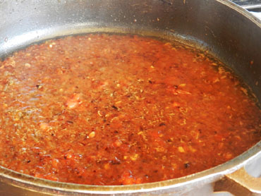 El sofregit pel pollastre amb escamarlans