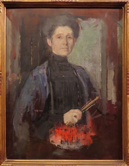 Olga Bozna&nacute;ska. Autoretrat amb raspall i flors. Ca. 1906
