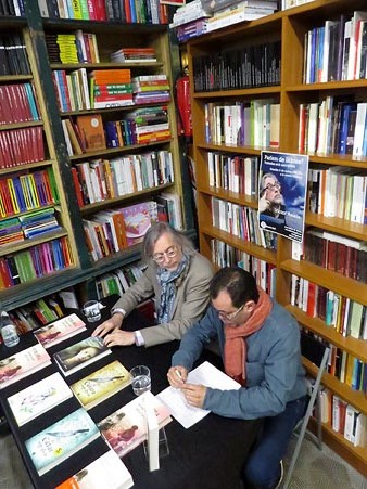 V&iacute;ctor Amela i Xavier Del&ograve;s durant l'esdeveniment